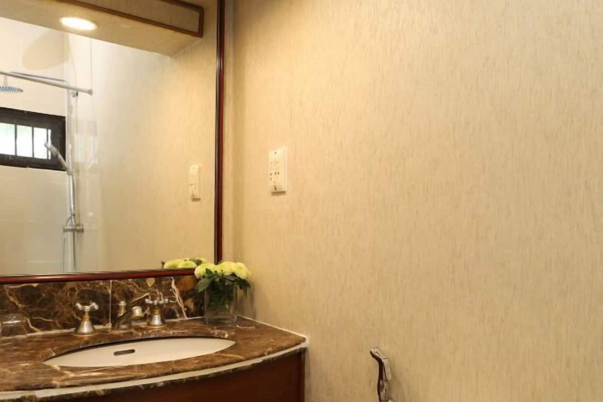 Bathroom | Shower, free toiletries, hair dryer, bathrobes