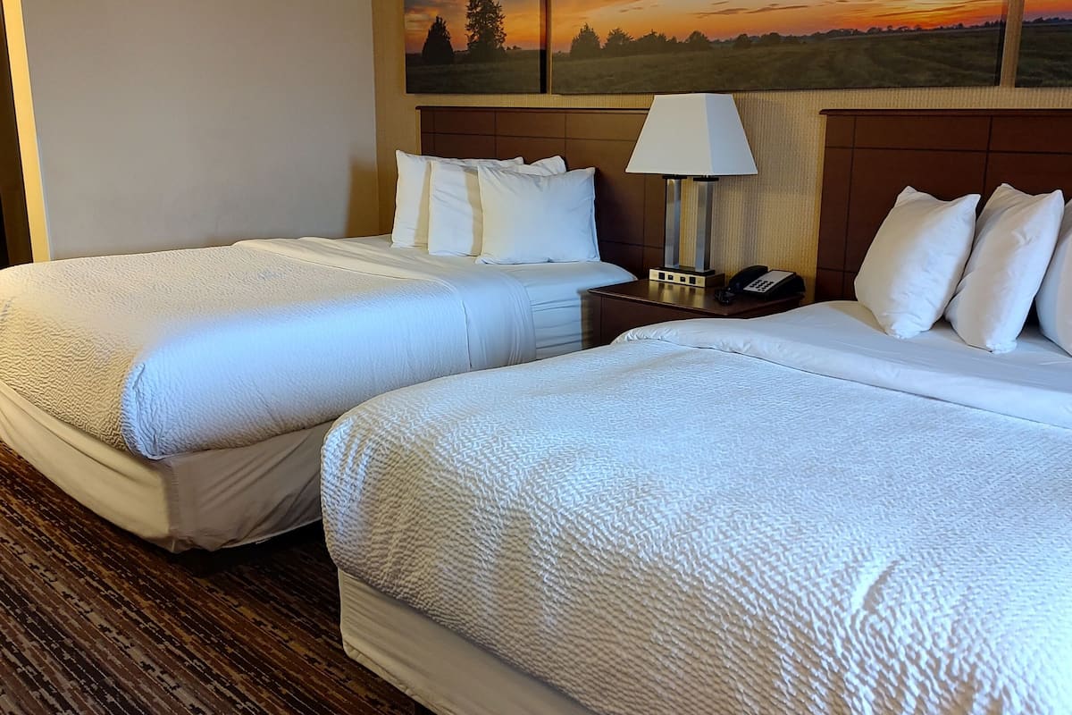 room, 2 queen beds, non smoking | 1 bedroom, down duvets, pillow-top beds, individually decorated