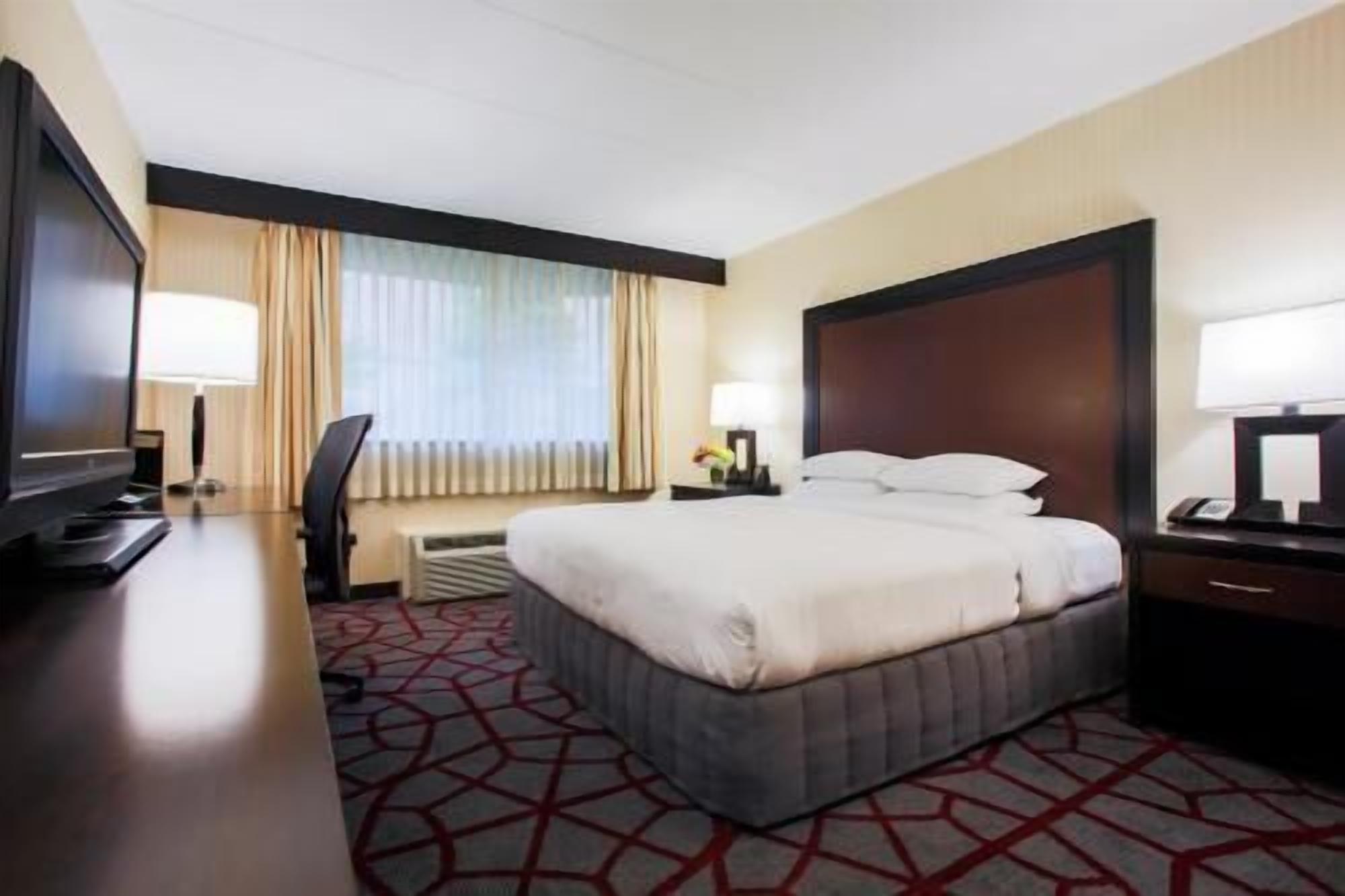 In-room safe, blackout curtains, iron/ironing board