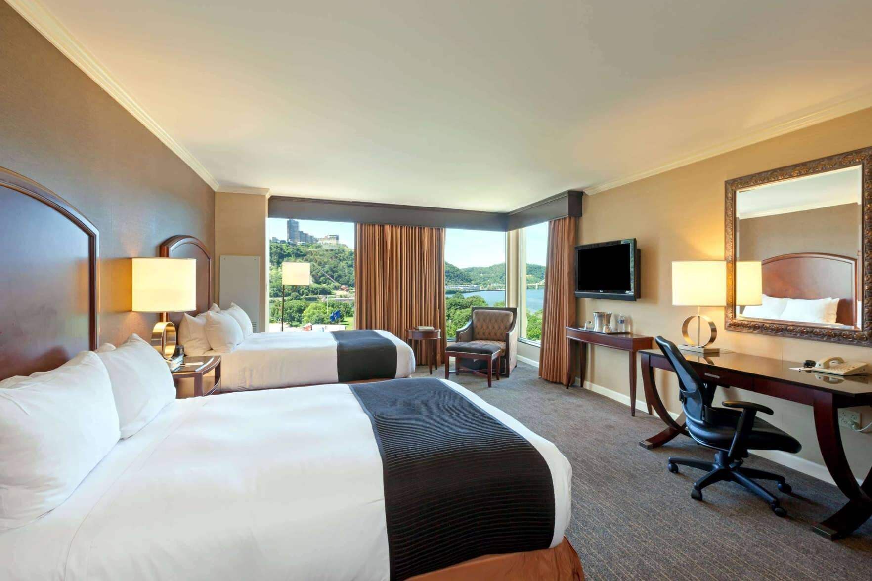 Premium bedding, pillowtop beds, desk, blackout drapes