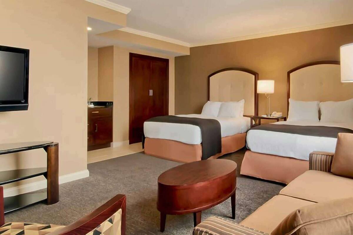 Premium bedding, pillowtop beds, desk, blackout drapes