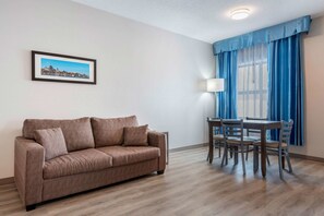 Suite, 1 King Bed with Sofa bed, Non Smoking | Premium bedding, desk, laptop workspace, iron/ironing board - Quality Suites Quebec (Québec City)