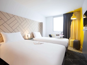 Standard Room, 2 Twin Beds | In-room safe, individually decorated, desk, blackout drapes