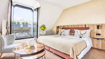 Ropa de cama de alta calidad, minibar, caja fuerte