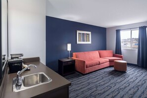 Suite, 1 King Bed, Non Smoking (One-Bedroom Suite) | Desk, iron/ironing board, free cribs/infant beds, rollaway beds - Travelodge Suites by Wyndham Saint John (Saint John)