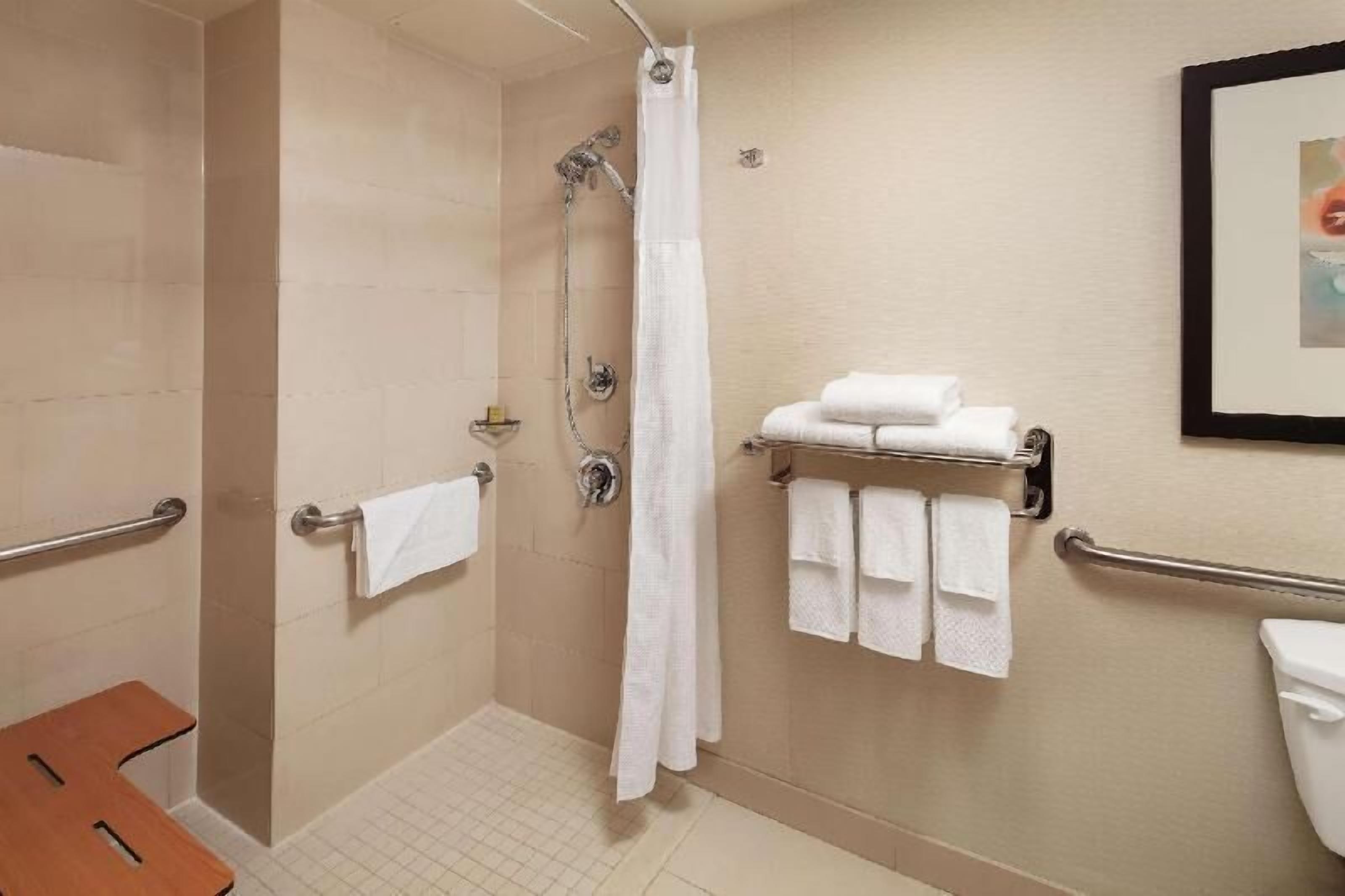 Bathroom | Hydromassage showerhead, designer toiletries, hair dryer, towels