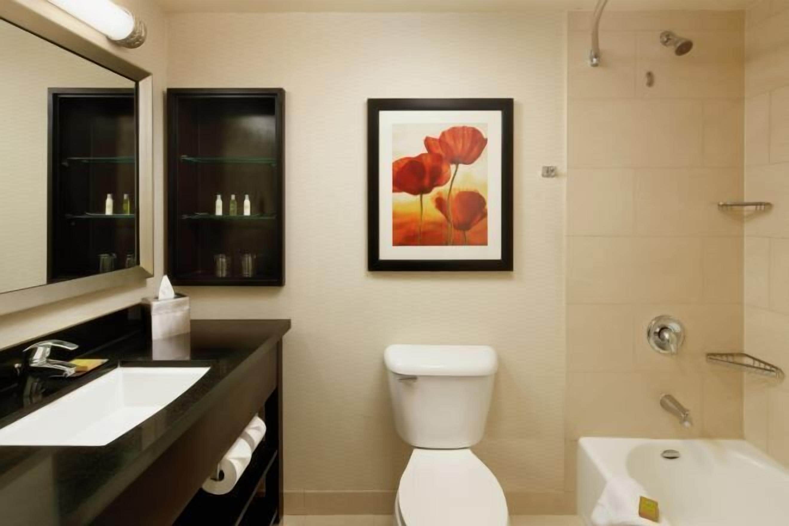 Bathroom | Hydromassage showerhead, designer toiletries, hair dryer, towels