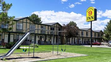 Experience the charm of the National 9 Inn, where a traditional design meets a fun playground for kids.