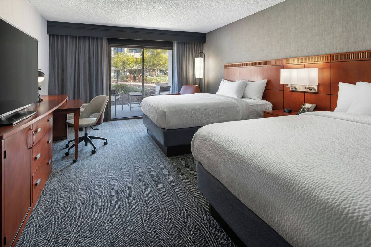 Premium bedding, down duvets, memory-foam beds, in-room safe