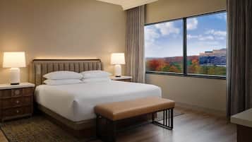 Suite | In-room safe, desk, laptop workspace, blackout drapes