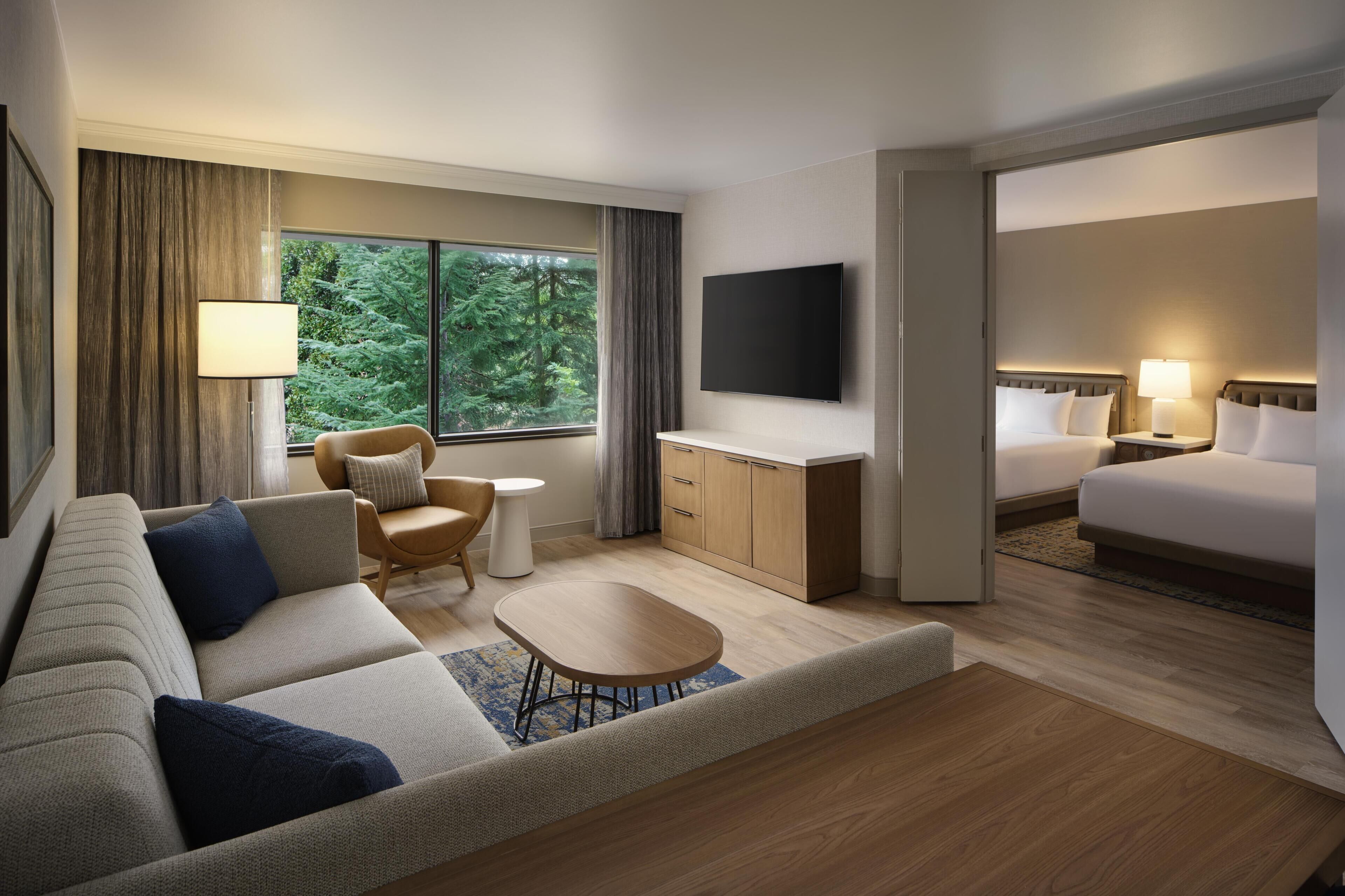 Suite (2 Queen Beds) | In-room safe, desk, laptop workspace, blackout curtains
