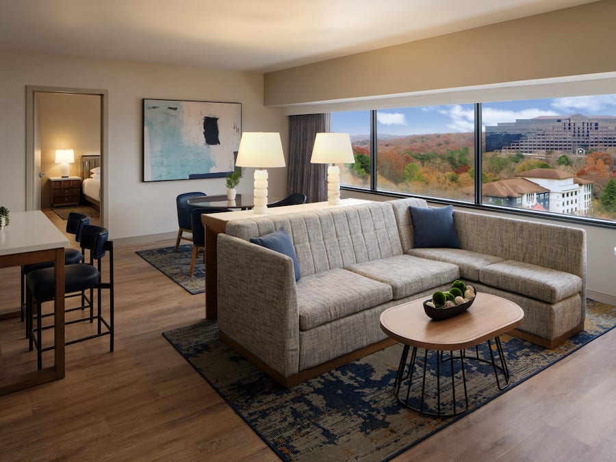 Suite | In-room safe, desk, laptop workspace, blackout drapes
