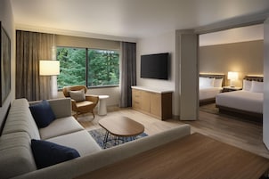 Suite (2 Queen Beds) | In-room safe, desk, laptop workspace, blackout drapes