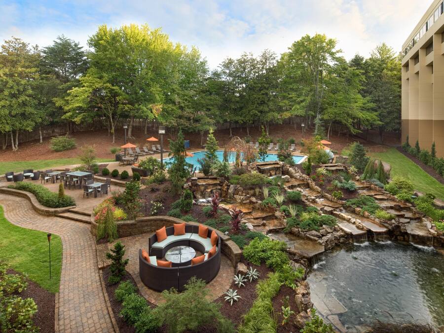 Seasonal outdoor pool, pool umbrellas, pool loungers