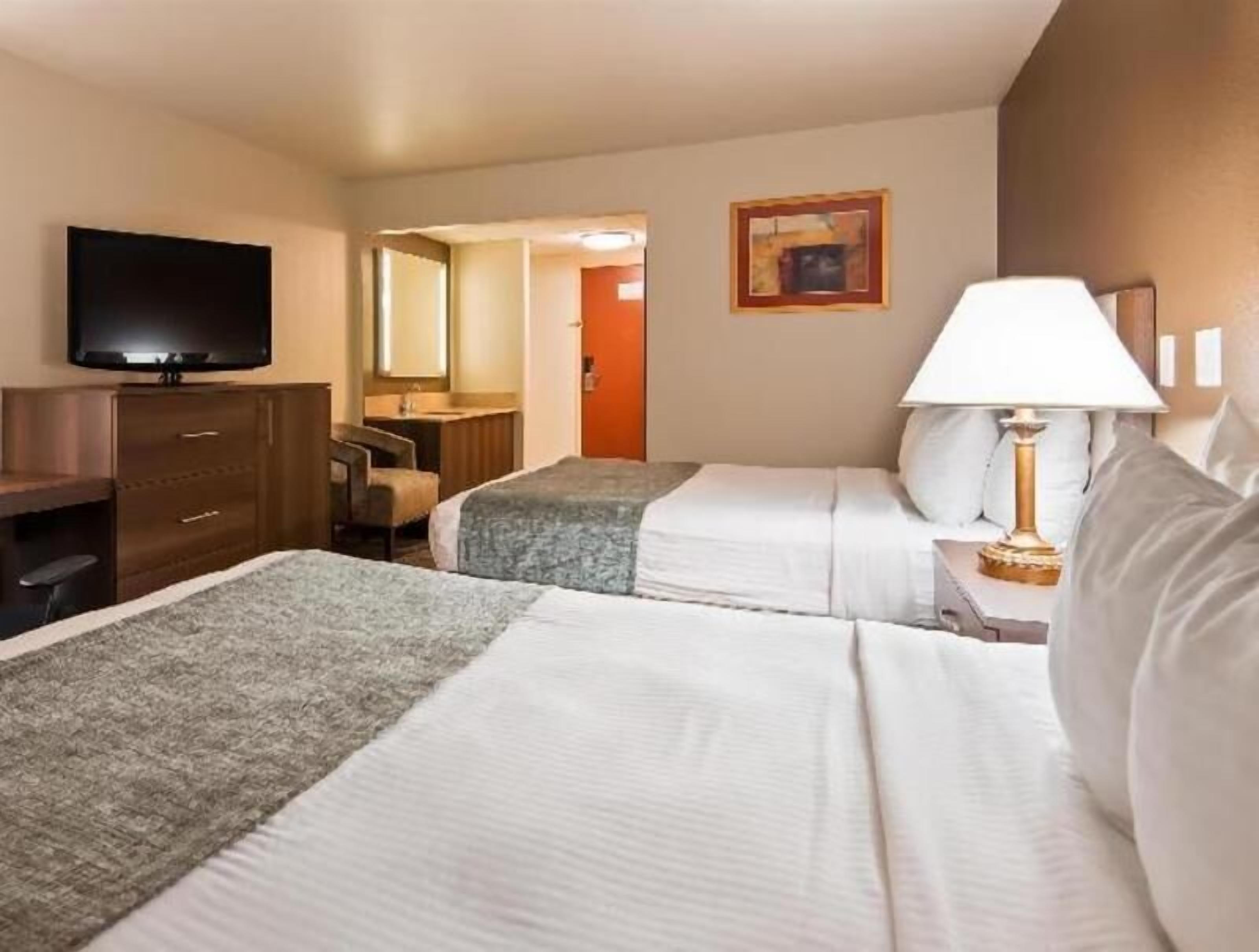 Premium bedding, pillowtop beds, in-room safe, individually decorated