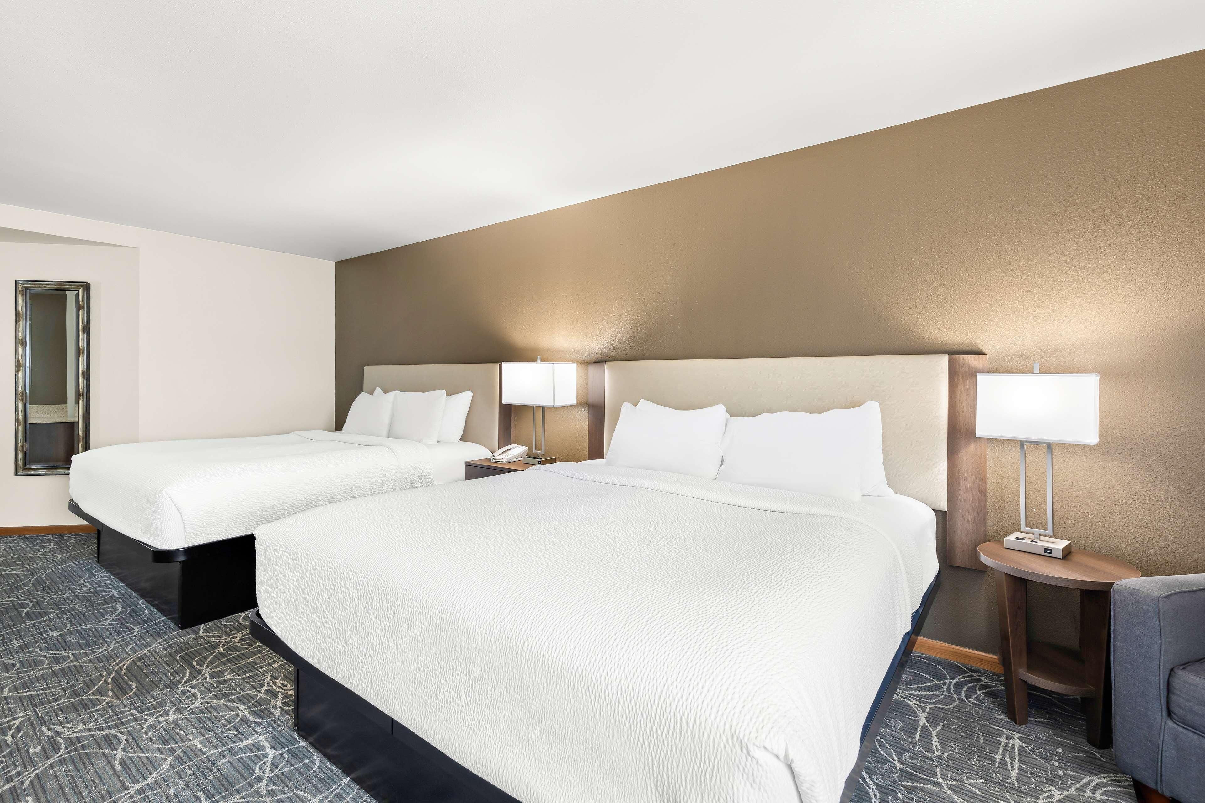 Premium bedding, pillow-top beds, in-room safe, desk