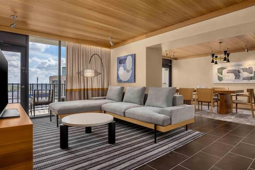 Presidential Suite, 1 King Bed | Living area | LCD TV, video game console, pay films