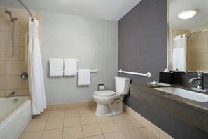 Room, 2 Double Beds | Bathroom | Combined shower/tub, free toiletries, hair dryer, towels