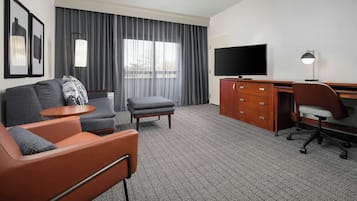 Suite, Multiple Beds | Living area | 42-inch flat-screen TV with cable channels, TV, Netflix