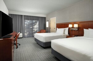 Room, 2 Double Beds | Desk, laptop workspace, blackout drapes, iron/ironing board