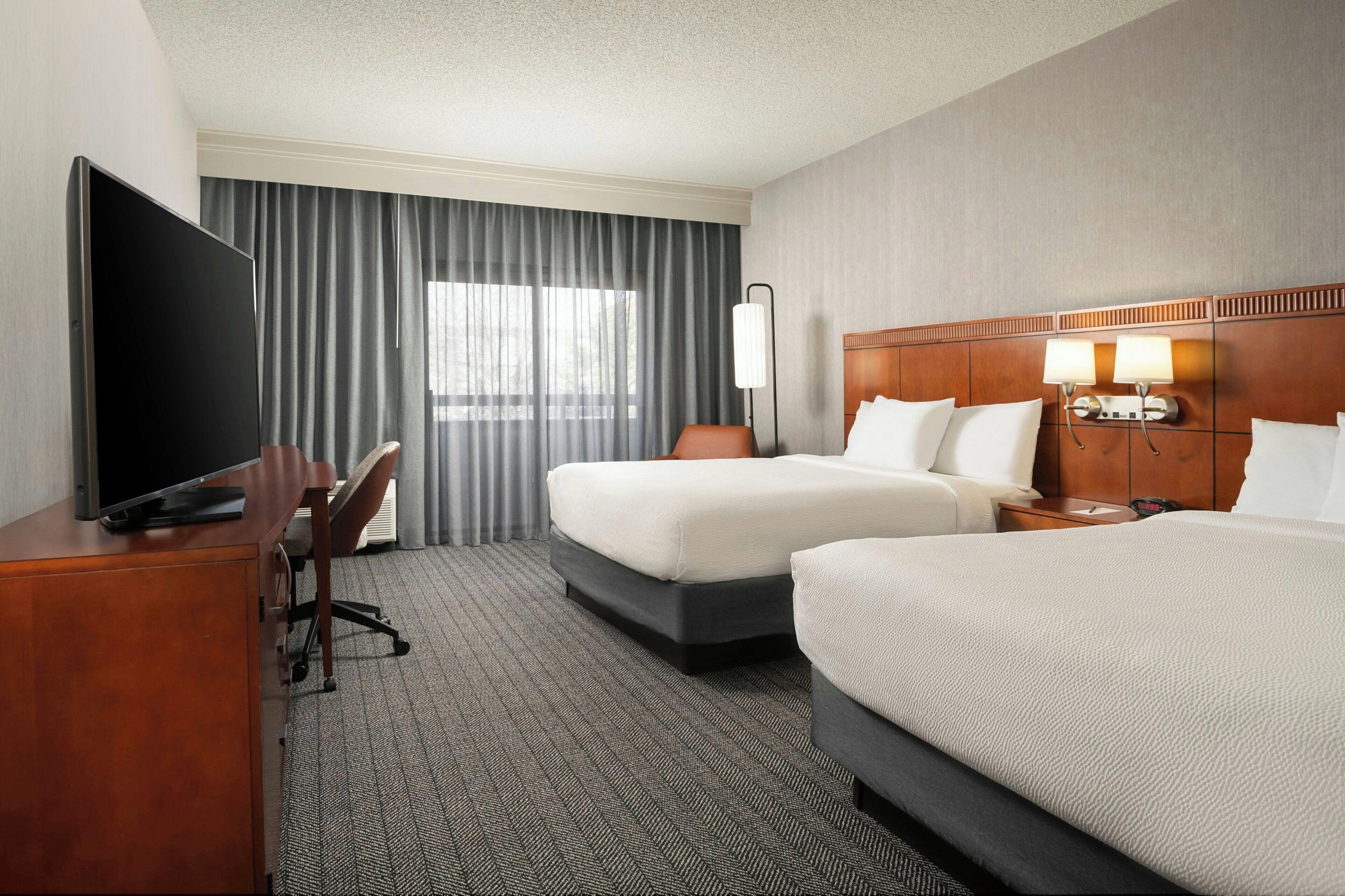 Room, 2 Queen Beds | Desk, laptop workspace, blackout drapes, iron/ironing board