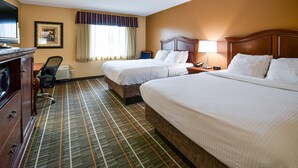 A hotel room with two beds, a desk, a chair, a TV, and a window with curtains. - Best Western Resort Hotel & Conference Center (Portage)