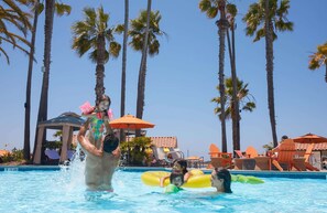 Outdoor pool, open 9:00 AM to 9:00 PM, cabanas (surcharge)