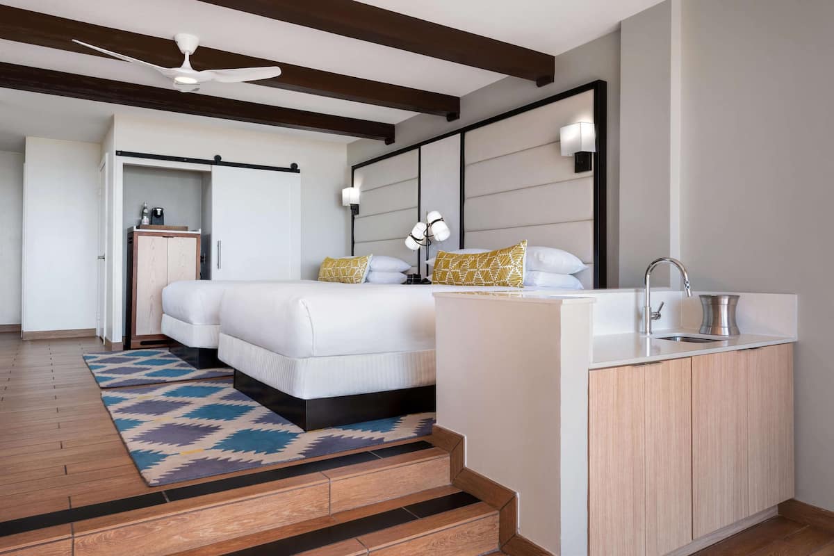 Premium bedding, down duvets, pillow-top beds, in-room safe