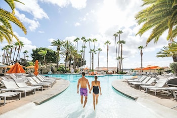 Outdoor pool, open 7:00 AM to 10:00 PM, cabanas (surcharge) at San Diego Mission Bay Resort