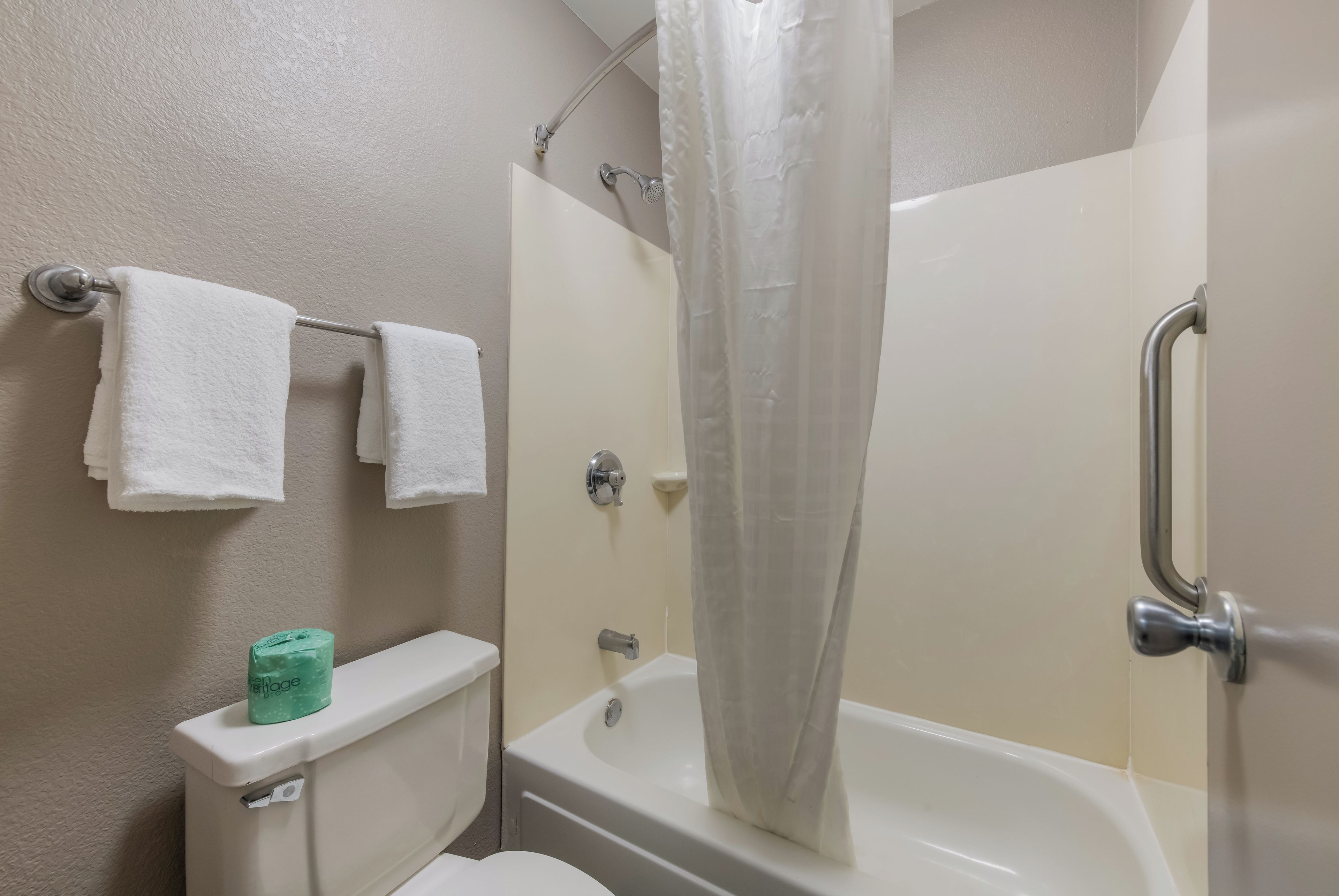 Hair dryer, towels, soap, shampoo