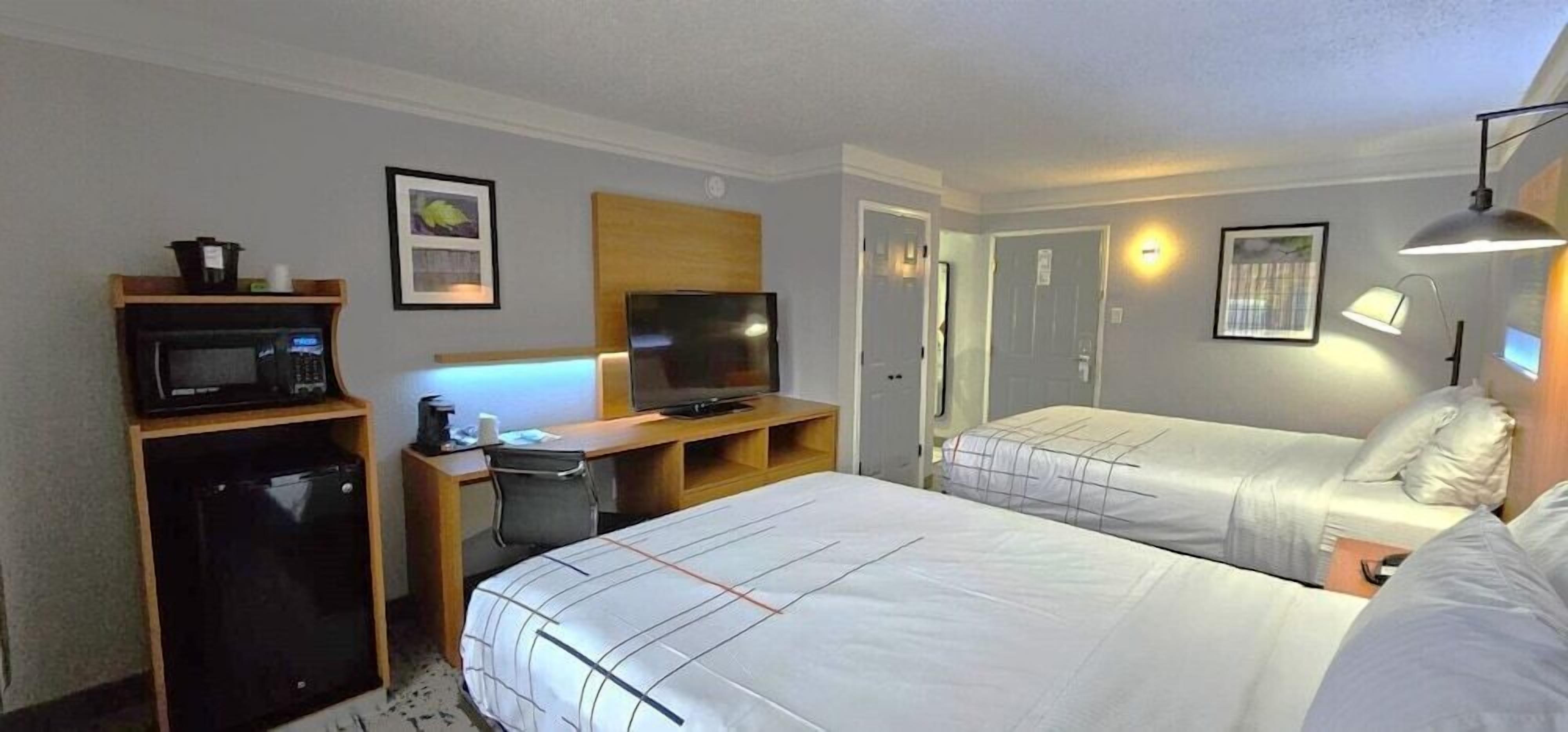 Premium bedding, desk, blackout curtains, iron/ironing board