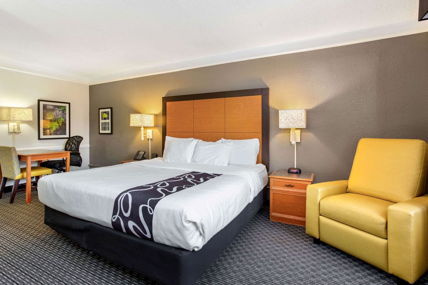 Premium bedding, desk, blackout curtains, iron/ironing board