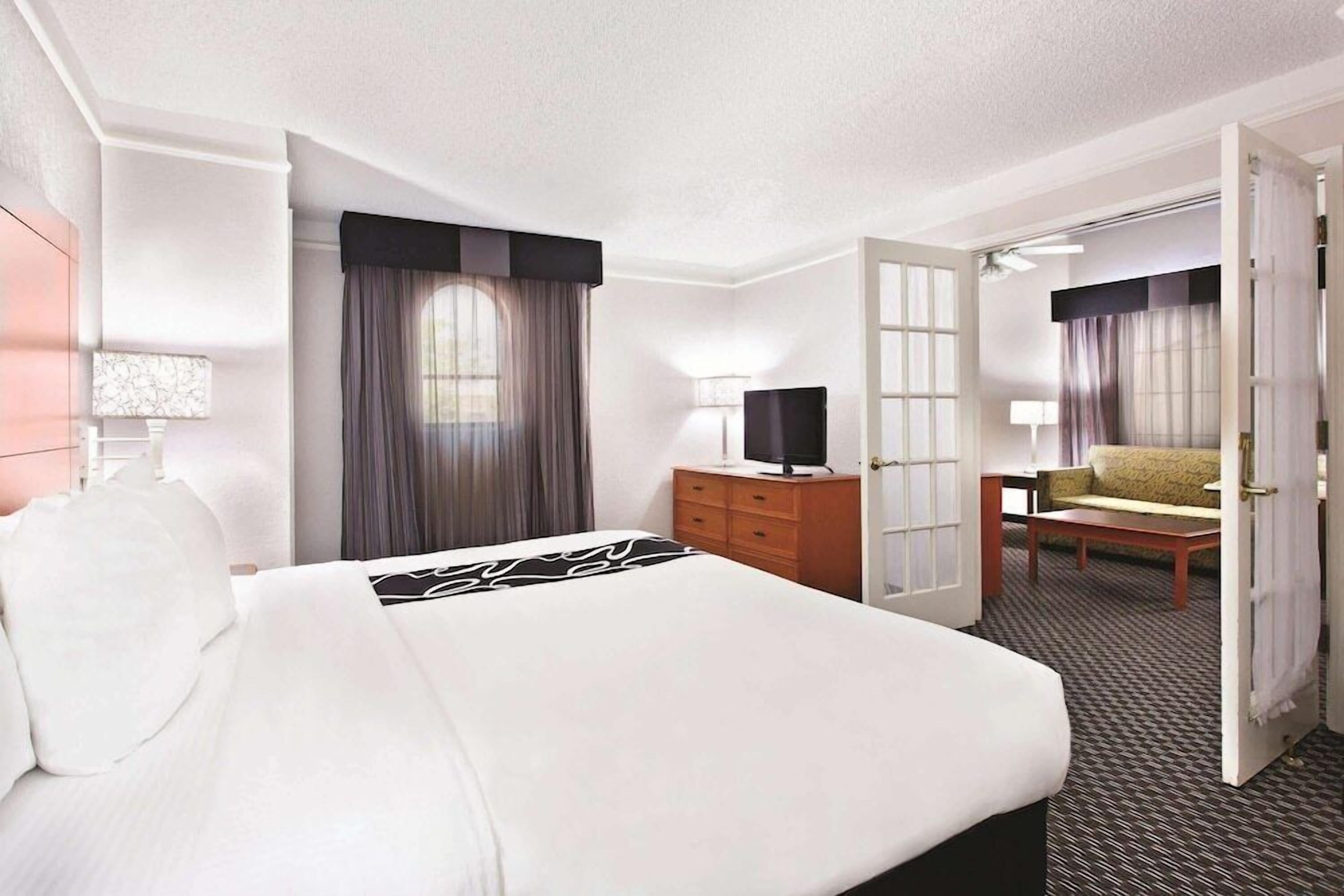 Premium bedding, desk, blackout curtains, iron/ironing board