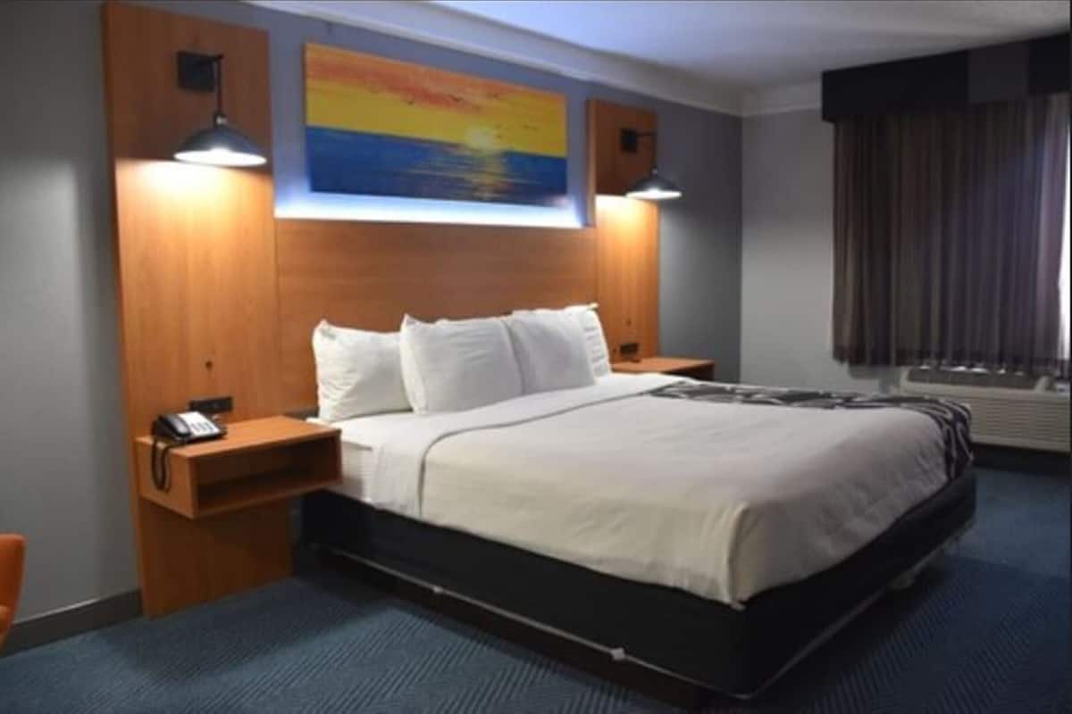 Premium bedding, desk, blackout curtains, iron/ironing board