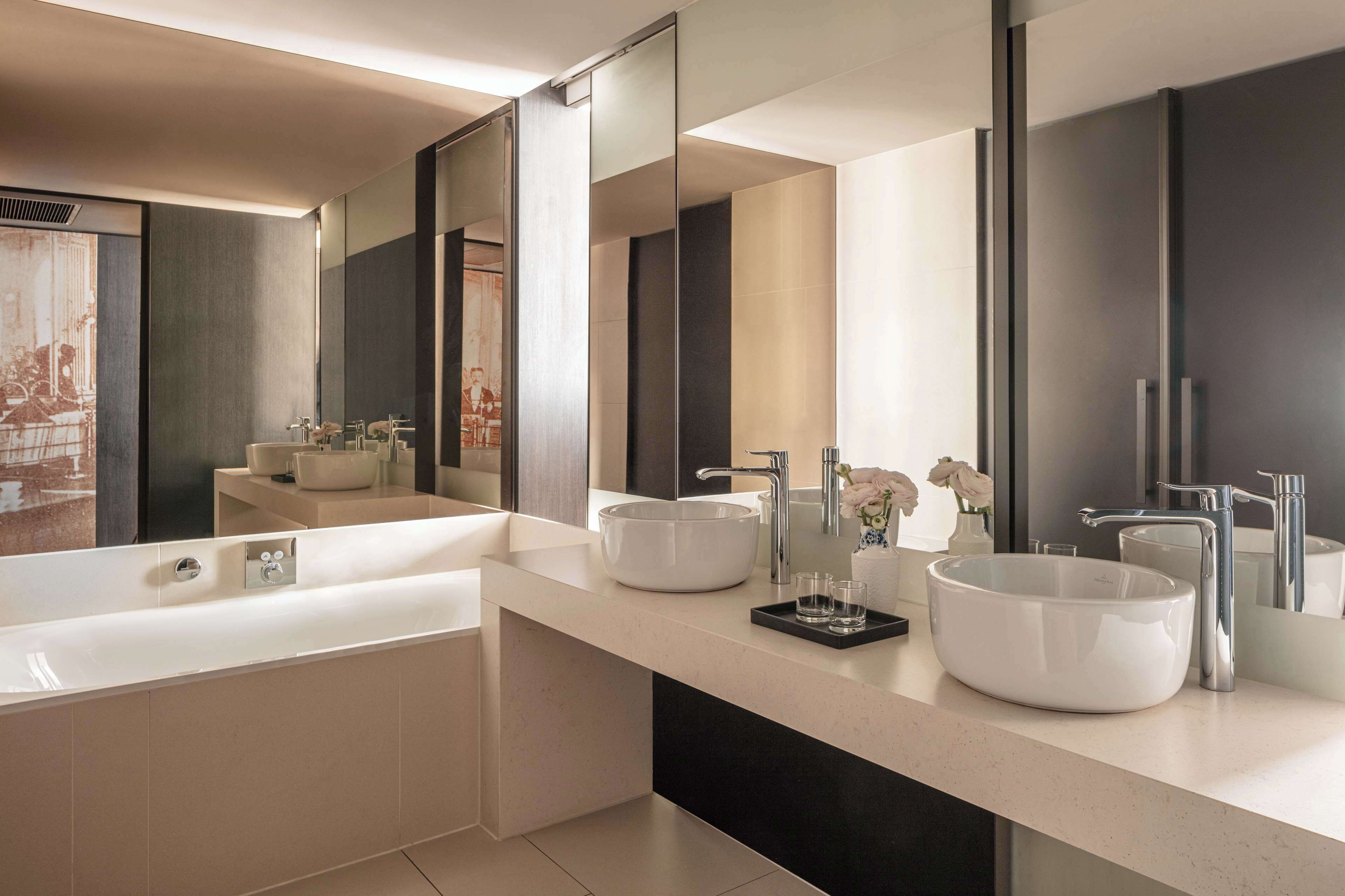 eco-friendly toiletries, hair dryer, bathrobes, slippers