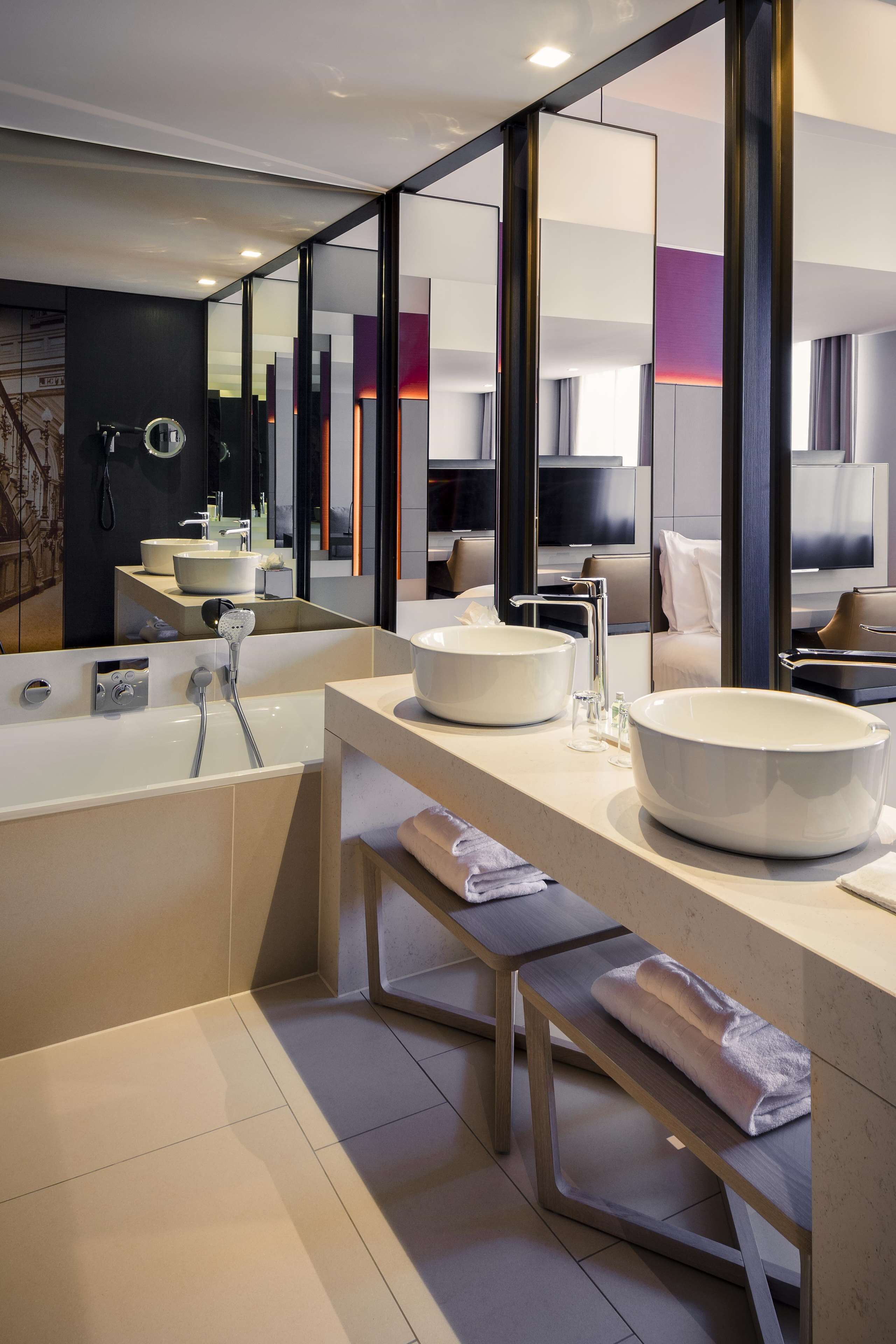 eco-friendly toiletries, hair dryer, bathrobes, slippers