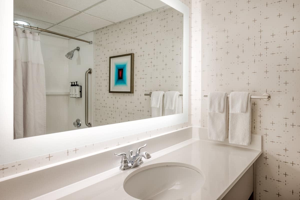 standard room, 2 queen beds, accessible bathtub (communications, roll-in shower) | bathroom | combined shower/bathtub, free toiletries, hair dryer, towels