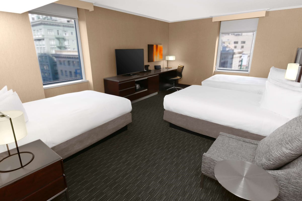 Room, 3 Double Beds | Hypo-allergenic bedding, in-room safe, desk, iron/ironing board