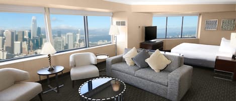 Deluxe Corner King Junior Suite | Living area | 37-inch flat-screen TV with satellite channels, TV