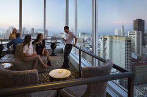 2 bars/lounges, rooftop bar, lobby lounge
