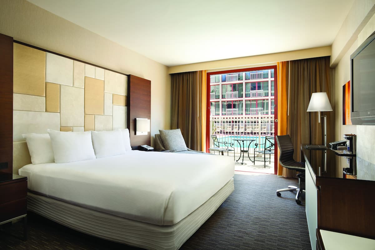 Pool View with Terrace - 1 King Bed | Hypo-allergenic bedding, in-room safe, desk, iron/ironing board