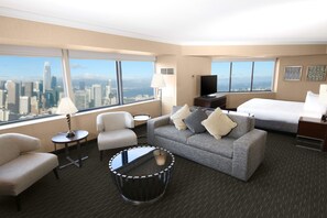 Deluxe Corner King Junior Suite | Living area | 37-inch flat-screen TV with satellite channels, TV