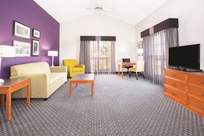 Deluxe Suite, 1 King Bed, Non Smoking | Premium bedding, desk, blackout curtains, iron/ironing board