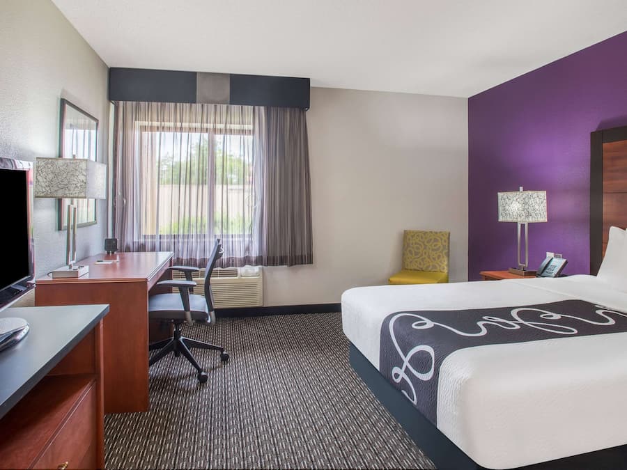 Premium bedding, desk, blackout drapes, iron/ironing board