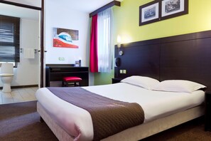 Premium bedding, laptop workspace, blackout curtains, soundproofing