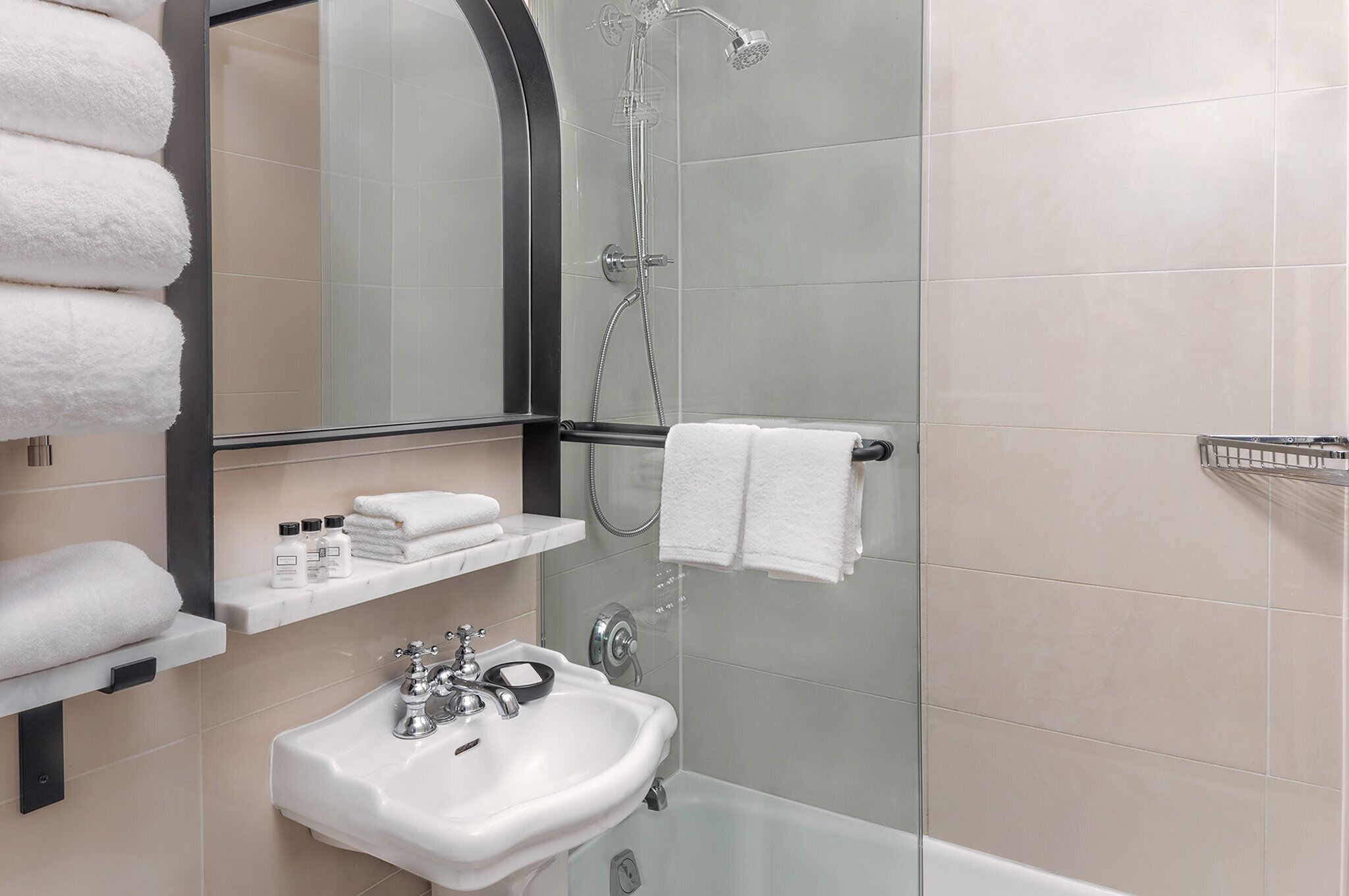 Combined shower/tub, designer toiletries, hair dryer, towels