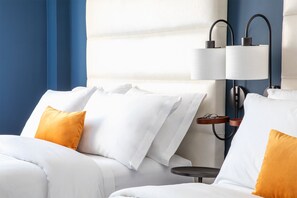 Luxe beddengoed, pillowtop-bedden, een kluis op de kamer