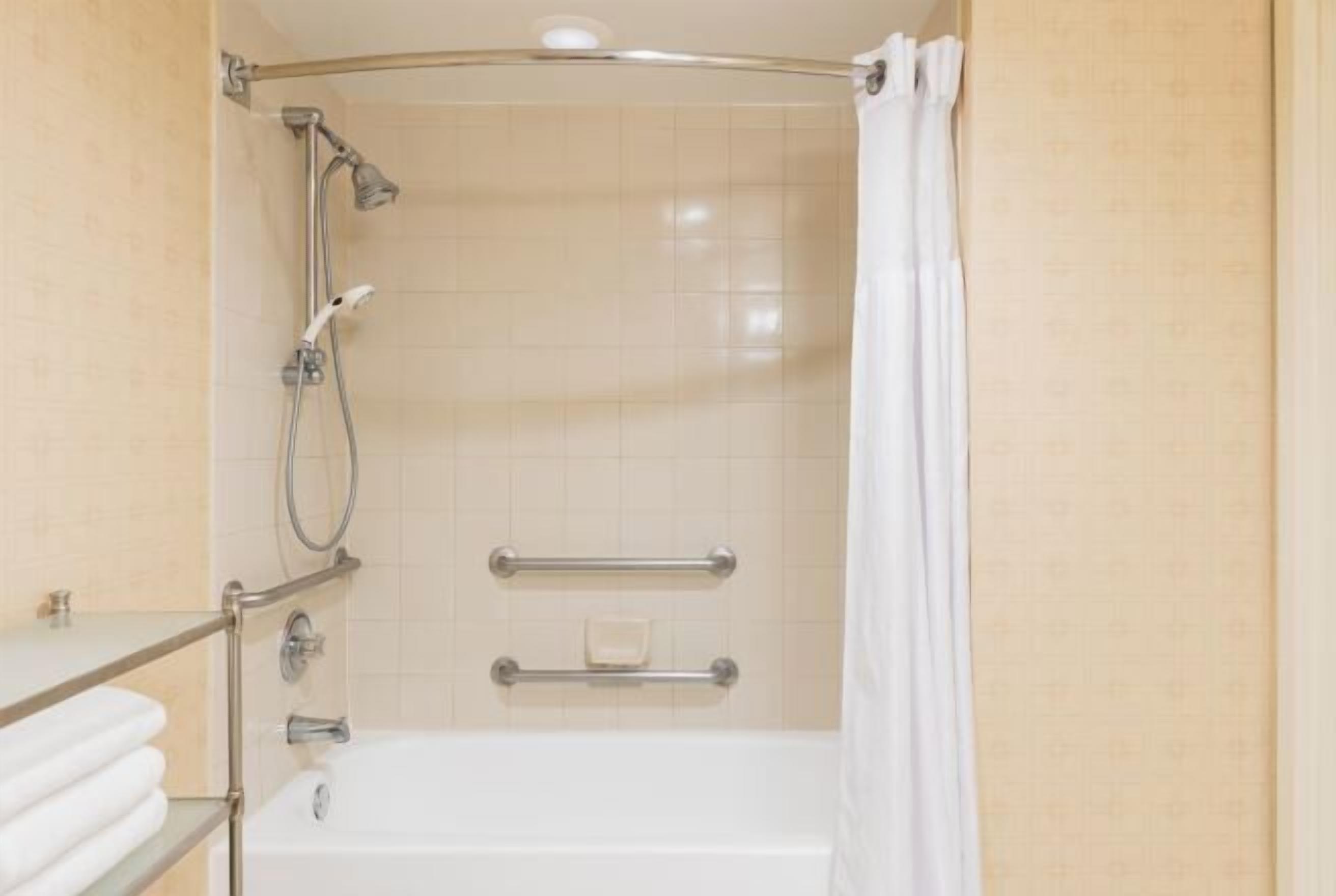 Combined shower/tub, eco-friendly toiletries, hair dryer, bathrobes