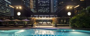 Outdoor pool, open 7:00 AM to 7:00 PM, free cabanas, pool umbrellas