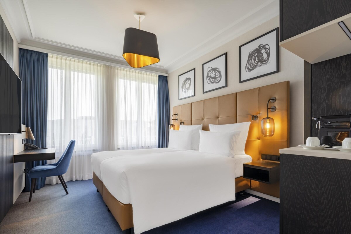 Business-Doppelzimmer | Allergikerbettwaren, Minibar, Zimmersafe, Schreibtisch